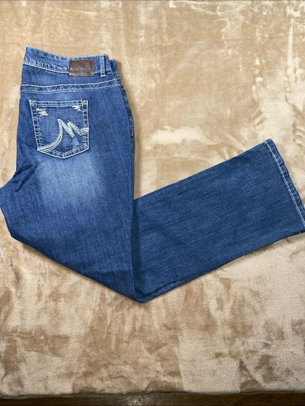 Maurices Dark Blue Flare Jeans with Embroidered Back Pocket
